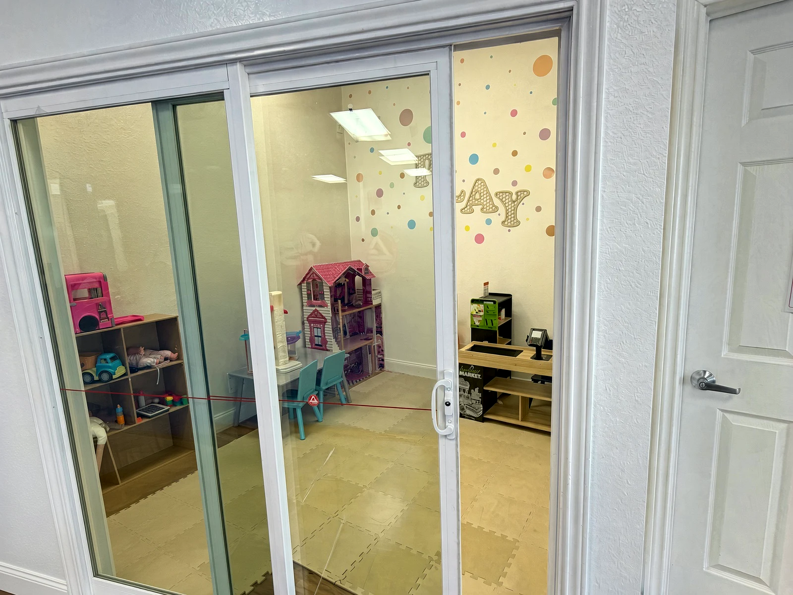 Kids Room at Gracie Barra Southlake, seen through the glass door